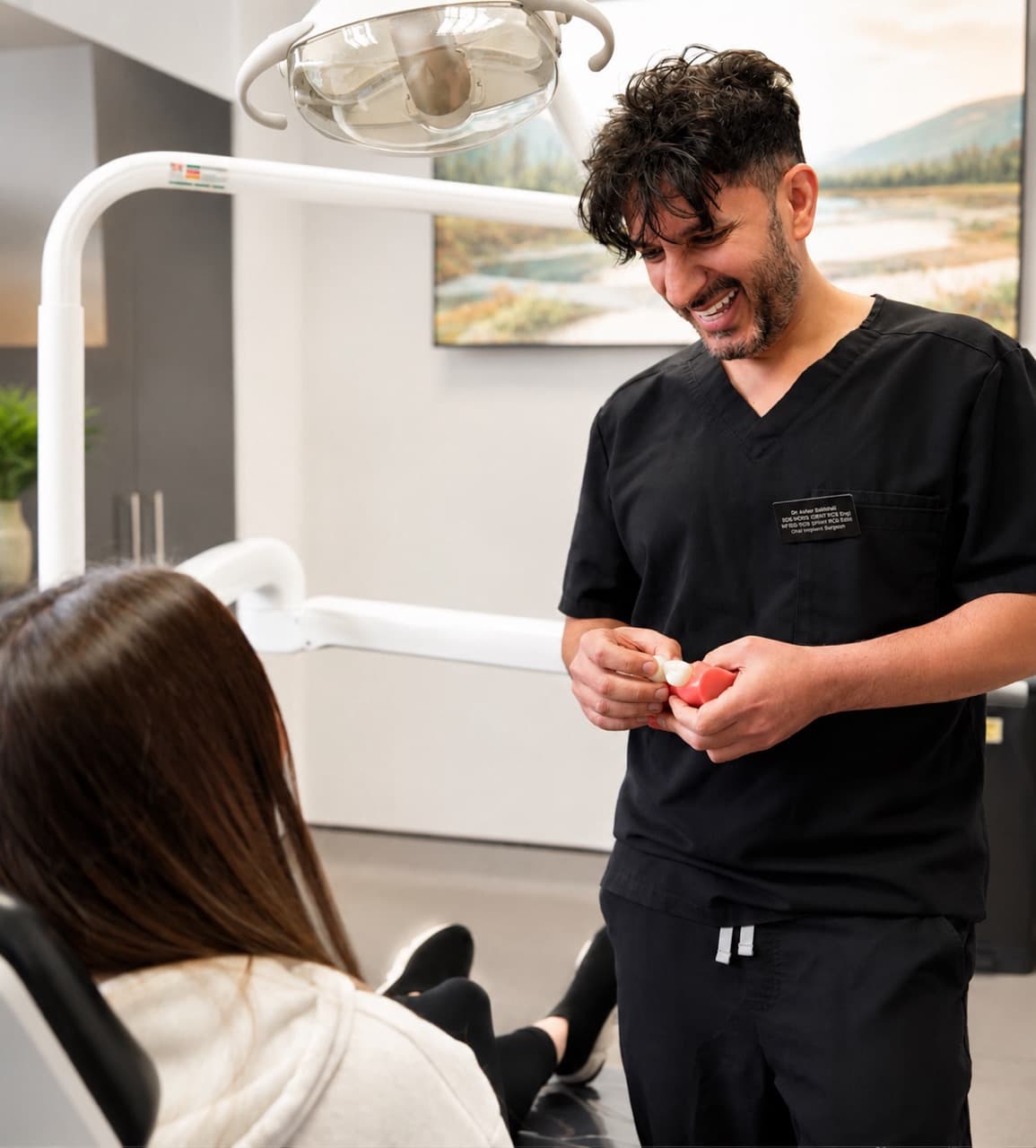 A dentist chatting with a patient at the practice